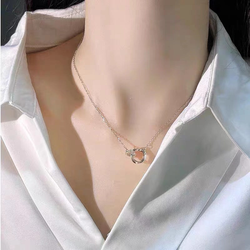 Micro-embellished Mobius interlocking clavicle necklace